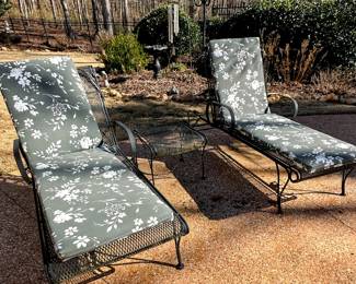 Wrought iron lounge chairs and side table