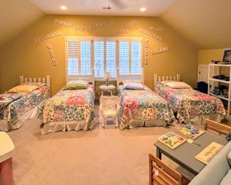 Children's room with 6 twin beds, books, toys, games, puzzles, linens, tables, sofa, side tables, lamps, children vintage chairs, baby clothes and much more!