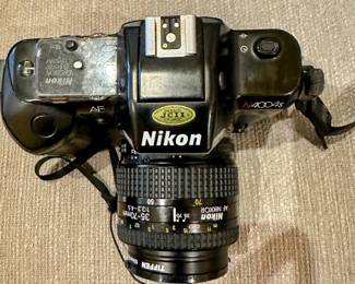 Vintage Nikon film camera for parts and a Nikon 35-70mm lens