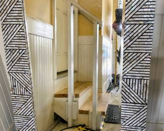 Large opal and black framed beveled mirror