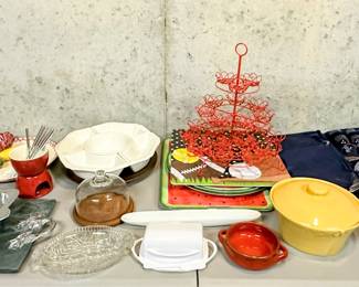 Lots of serving, kitchen, baking and cookware including Mikasa, Wilton, KitchenAid, Cuisinart, Arthur Court, Lodge, and much more!