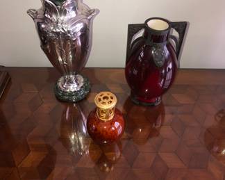 Christofle tall silver plated vase on left