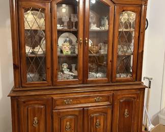This is a lovely china cabinet that could be yours.
