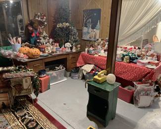 Lots of holiday decorations are shown in this photo.  In addition to Christmas, there are some Halloween decorations, too.  In the lower left, there are some LPs.  You'll need to come to the sale to see what is there.