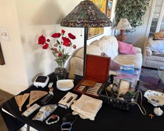 Fans, linens, knives, Tiffany style floor lamp