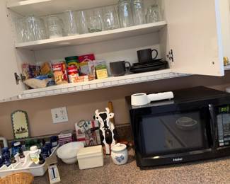 Microwave, glasses, food items