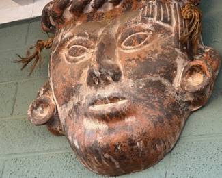 Large wall hanging of President Trump,,, well it kind of looks like him