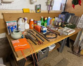 Chemicals, pottery, tools, rakes and a kids Home Depot apron--remember all those moms who took their kids to HD to build things on Saturday mornings?