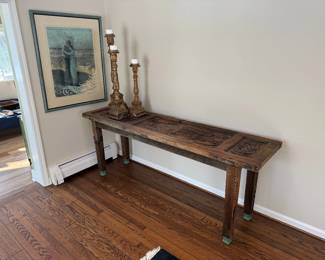 Rustic table made from a church door. Very unique and detailed