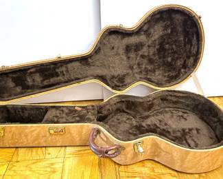 Hardshell Guitar Case With Faux Fur Lining
Lot #: 36