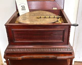 Antique 1890s Regina Disc Music Box In Mahogany Inlaid Cabinet, Model 11 For 12.5 Inch Discs, Numbered 69107
Lot #: 5
