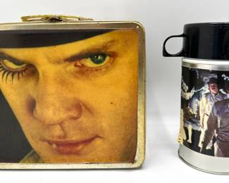 A Clockwork Orange Malcolm McDowell Tin Lunchbox With Matching Thermos By American Studios
Lot #: 20