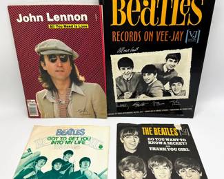 1998 Beatles Book, 1980 John Lennon Book & 2 Beatles 45 Covers (Records Not Included)
Lot #: 18
