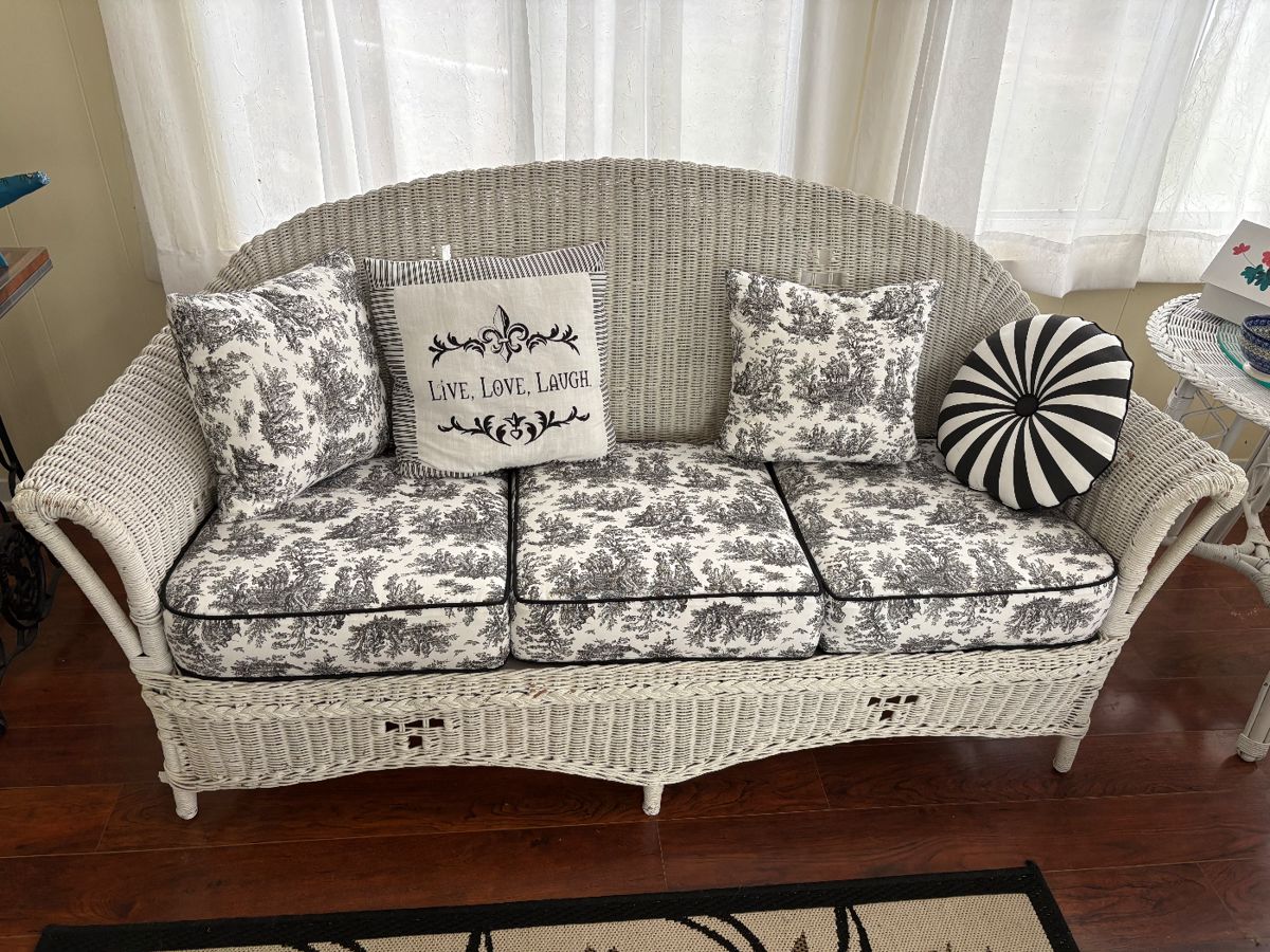 The wicker in these photos is real wicker, not vinyl