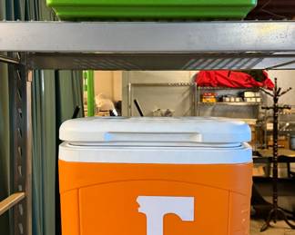 Green Coleman Stacker 24 Party Cooler and Orange Igloo NCAA Tennessee Ice Cube Roller Cooler