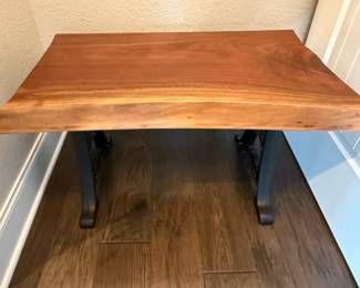 Natural wood bench with cast iron Apple Creek Casting base