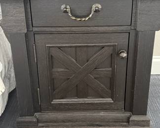 Black wood nightstand with natural top and built-in outlets from Knoxville Wholesale