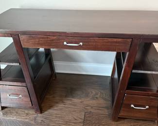 Canyon Furniture dark wood angled desk from Rooms to Go