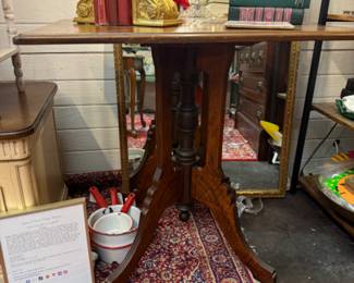 gold book ends, vintage books, chunky candlesticks, pots