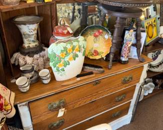 dresser, vases, decorative plates