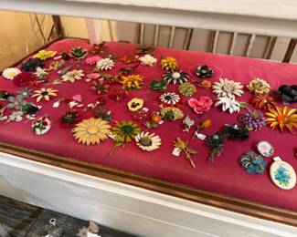 lots of brooches