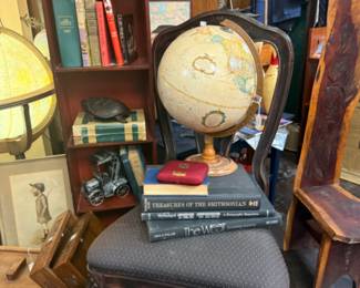 stand globe and lit stand globe, chair, vookshelf