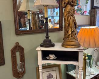 lady statuary, vintage side table, mirrors, lamps