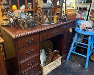 wooden desk, stool, lamp, figurines