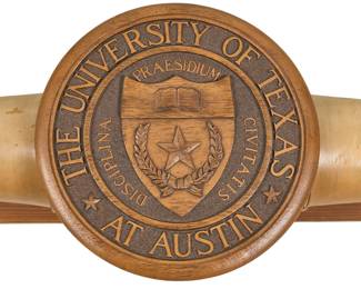 Longhorn mount featuring the University of Texas' seal carved in Texas pecan wood
height 15 in. x width 74 in. x depth 17 in.
