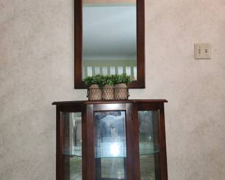 Display cabinet with matching mirror