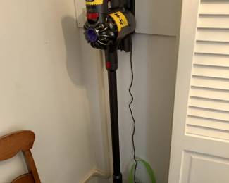 #66	Dyson Cordless Vac w/wall Mount and Attachments	 $100.00 
