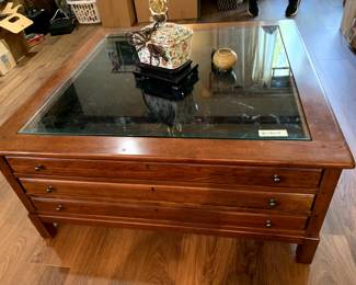 #200	Timberlake Coffee Table w/3 Sliding Drawers open to each side and glass display top - 40x40x19	 $200.00 

