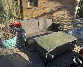 #236	Lazy Boy Plastic Wicker and Metal Patio Set - 2 Chairs (29"), Couch (69"), and Glass Top Coffee Table (48x26x19)	 $350.00 
