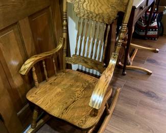 #150	oak carved back rocker 	 $65.00 

