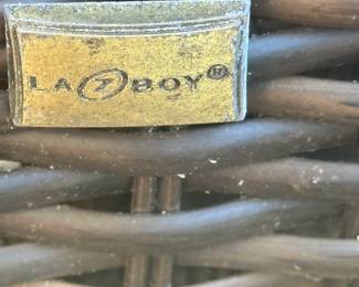 #236	Lazy Boy Plastic Wicker and Metal Patio Set - 2 Chairs (29"), Couch (69"), and Glass Top Coffee Table (48x26x19)	 $350.00 
