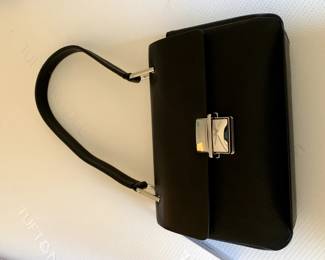 #82	Calvin Klein Black Shoulder Purse w/tags	 $25.00 

