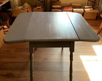 #183	Blue painted Wood Drop-side Table - 34x22-42x30	 $75.00 
