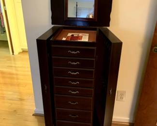 #92	Powell Jewelry Armoire w/sides open and Flip-top w/mirror and 8 drawers - You Move downstairs - 18x15x41	 $75.00 
