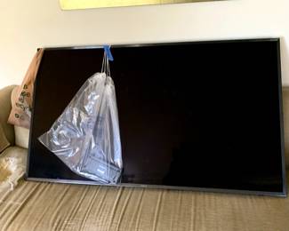 #52	Samsung Flatscreen - 56" Wide w/remote	 $75.00 

