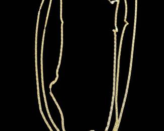 003 18K Gold In Triplicate