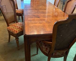 Dining table (shown with both leaves), 6 chairs and pads.......