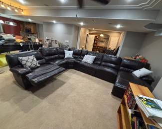 Huge leather family room couch with ottomans