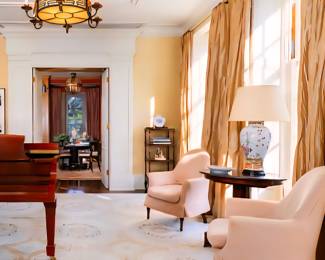 *(photo above: the pair of pink chairs photographed inside the home are in the sale. Nothing else in this photo is in the sale.)*