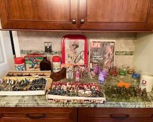 Antique toy soldiers, collectible character cups, playboy ashtray