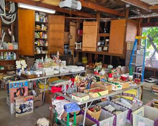 Garage brimming with Christmas, tools, etc