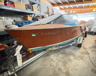 1960 Japanese Plywood Bottom Boat with a 350 stroke Chevy engine.