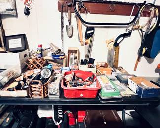 Garage with a table loaded with misc tools