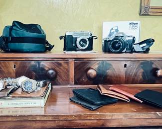 Variety of Cameras, watches ,wallets ,and cases