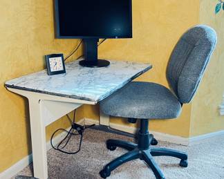 Nice Convenient  Desk -Herman Miller, with Chair Showing a Flat screen also. 