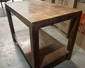 table and boxes of stuff to be unpacked